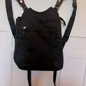 Hana D Berkeley black slim, expandable backpack.